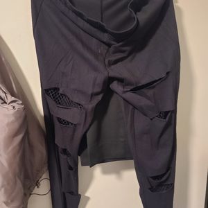 Torrid fishnet torn up leggings